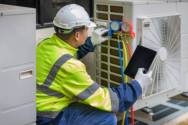 Professional Hvac technician working in Van Meter, IA